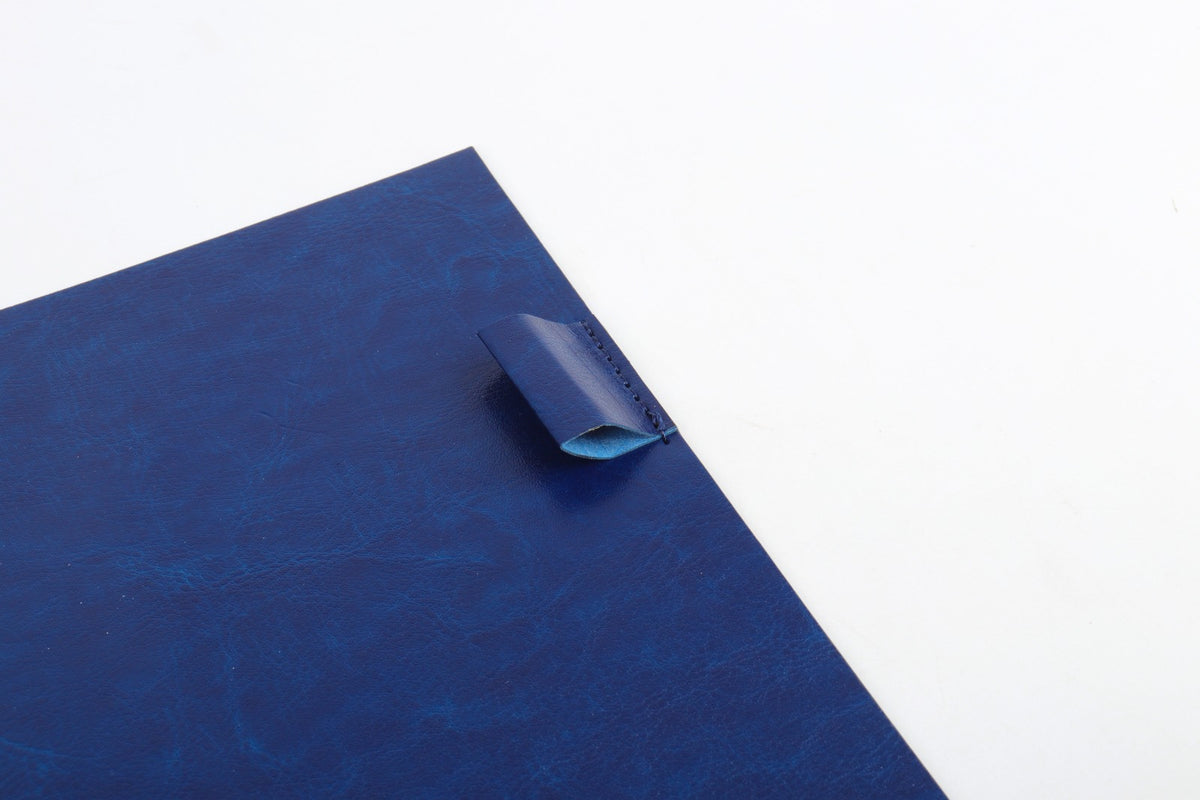 Close-up of the StratoPlanner leather cover and pen loop detail