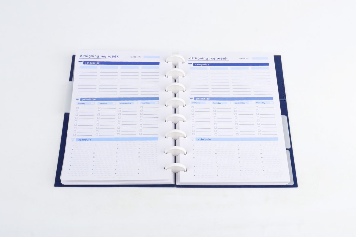 StratoPlanner weekly spread showing categorize, prioritize, and schedule sections