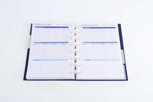 StratoPlanner weekly spread showing categorize, prioritize, and schedule sections